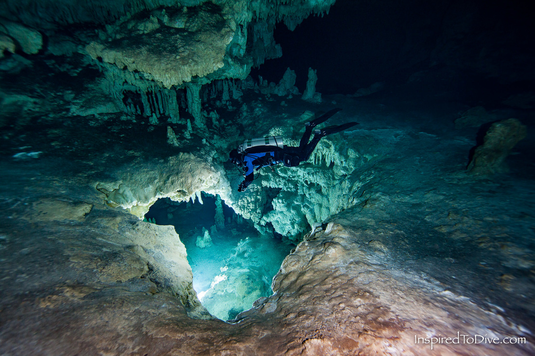 Scuba diver cave diving in Mexico