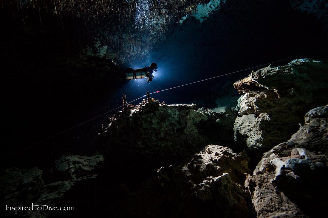 Cave diver on sidemount configuration in the cave system Minotauro in Mexico