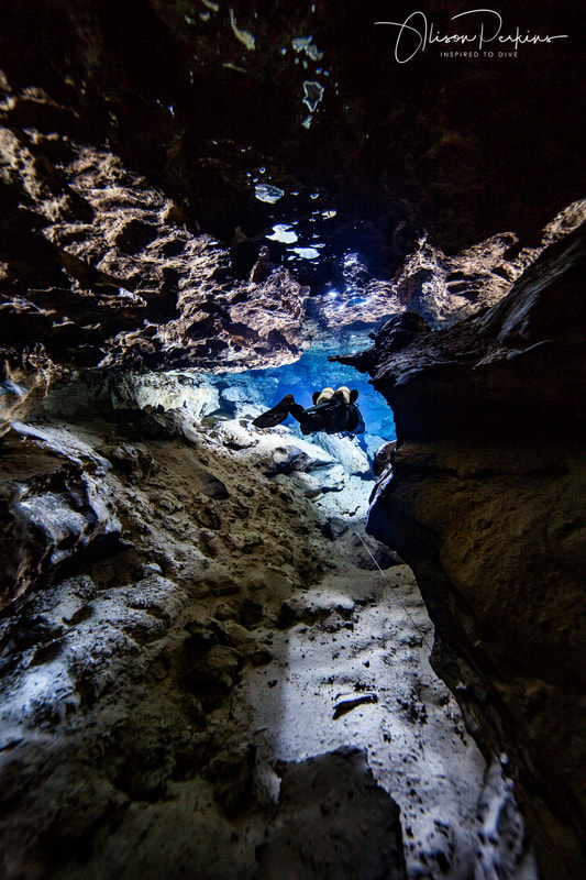 Cave diver Cameron Russo diving through F Tunnel in Australia's Tank Cave