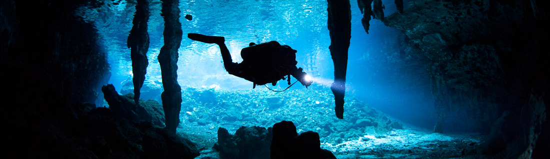 Cave diver in Grand Cenote in the Riviera Maya in Mexico